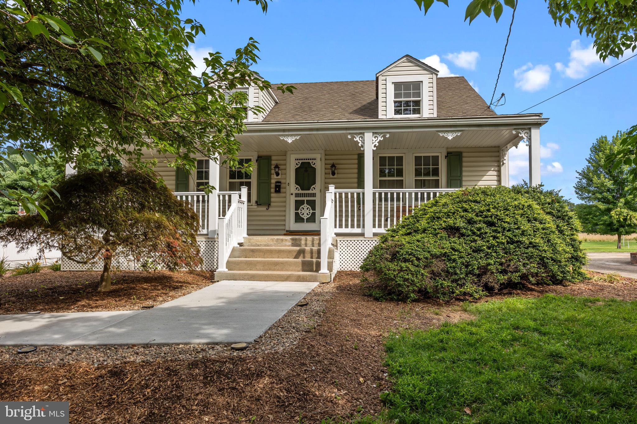 182 West Upper Ferry Road Ewing, NJ 08628 - Photo 2 of 33 a front view of a house with a garden
