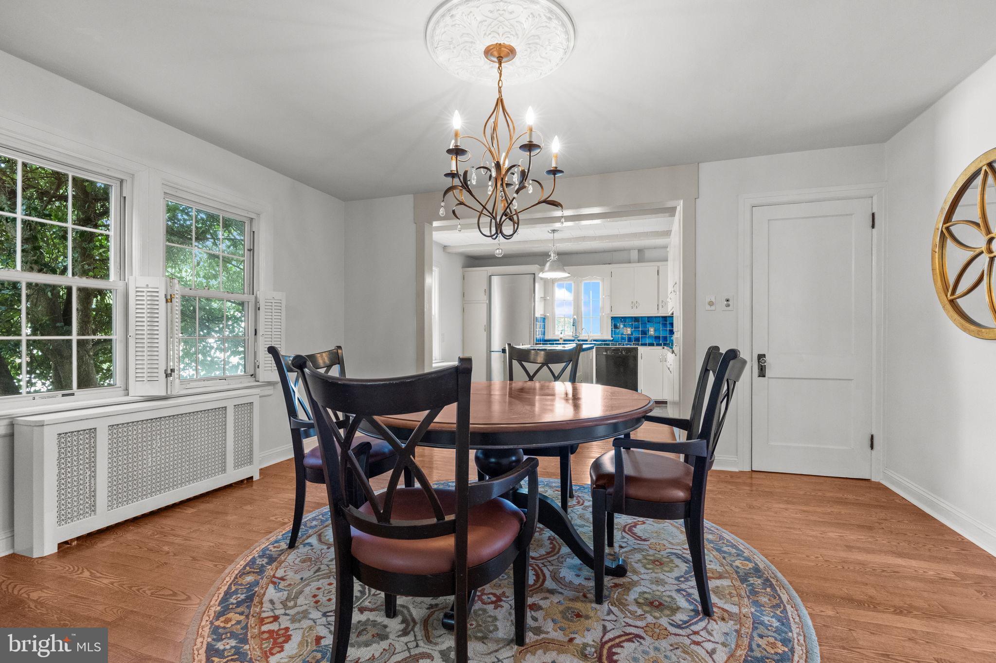 182 West Upper Ferry Road Ewing, NJ 08628 - Photo 7 of 33 a view of a dining room with furniture window and wooden floor