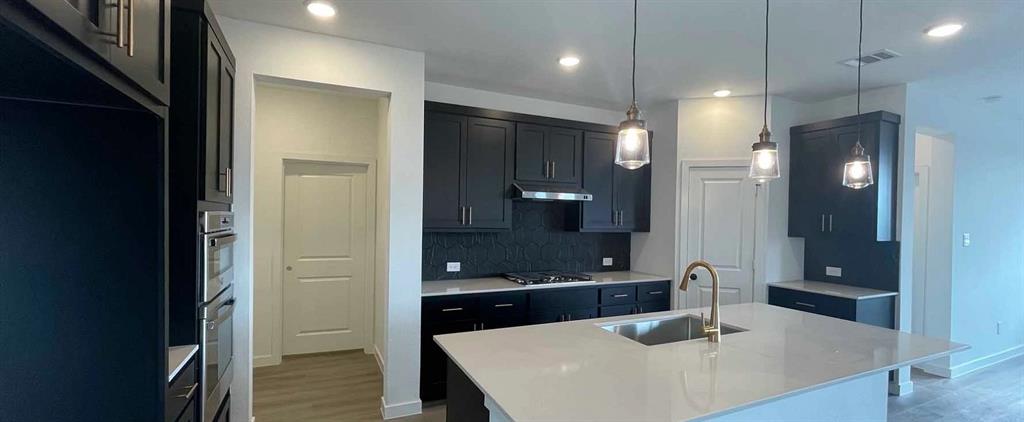 1612 Abbott Crk Road Celina, TX 75009 - Photo 15 of 34 Kitchen Construction Progress featuring the Noir Collection