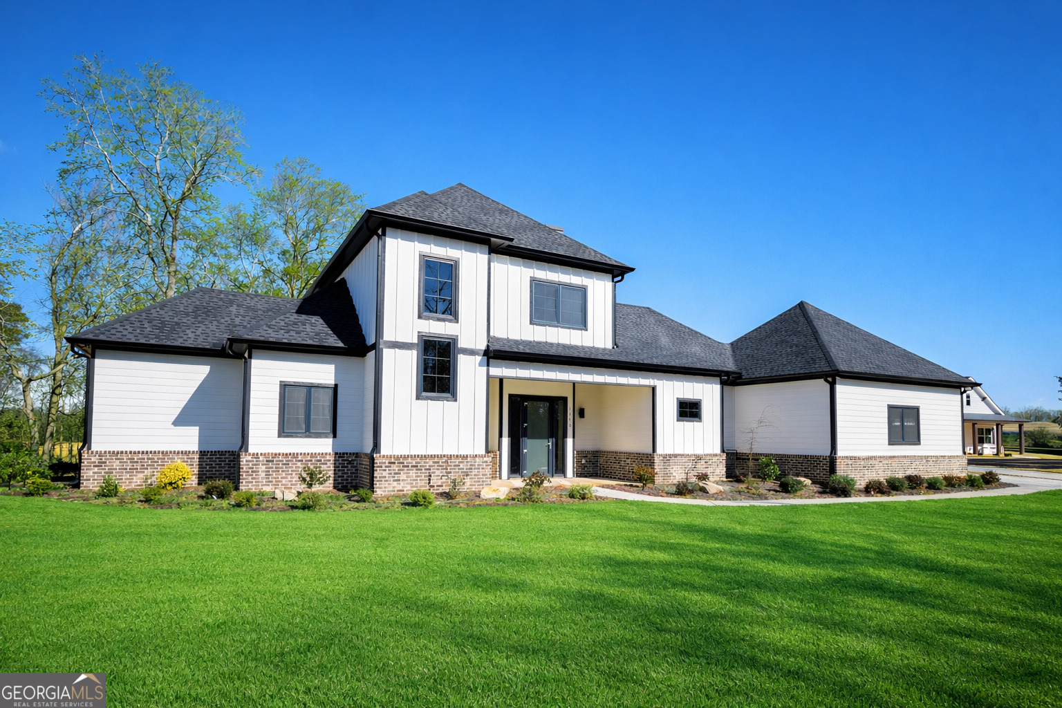1170 Mulberry Chase Commerce, GA 30530 - Photo 1 of 11 a front view of house with yard and green space