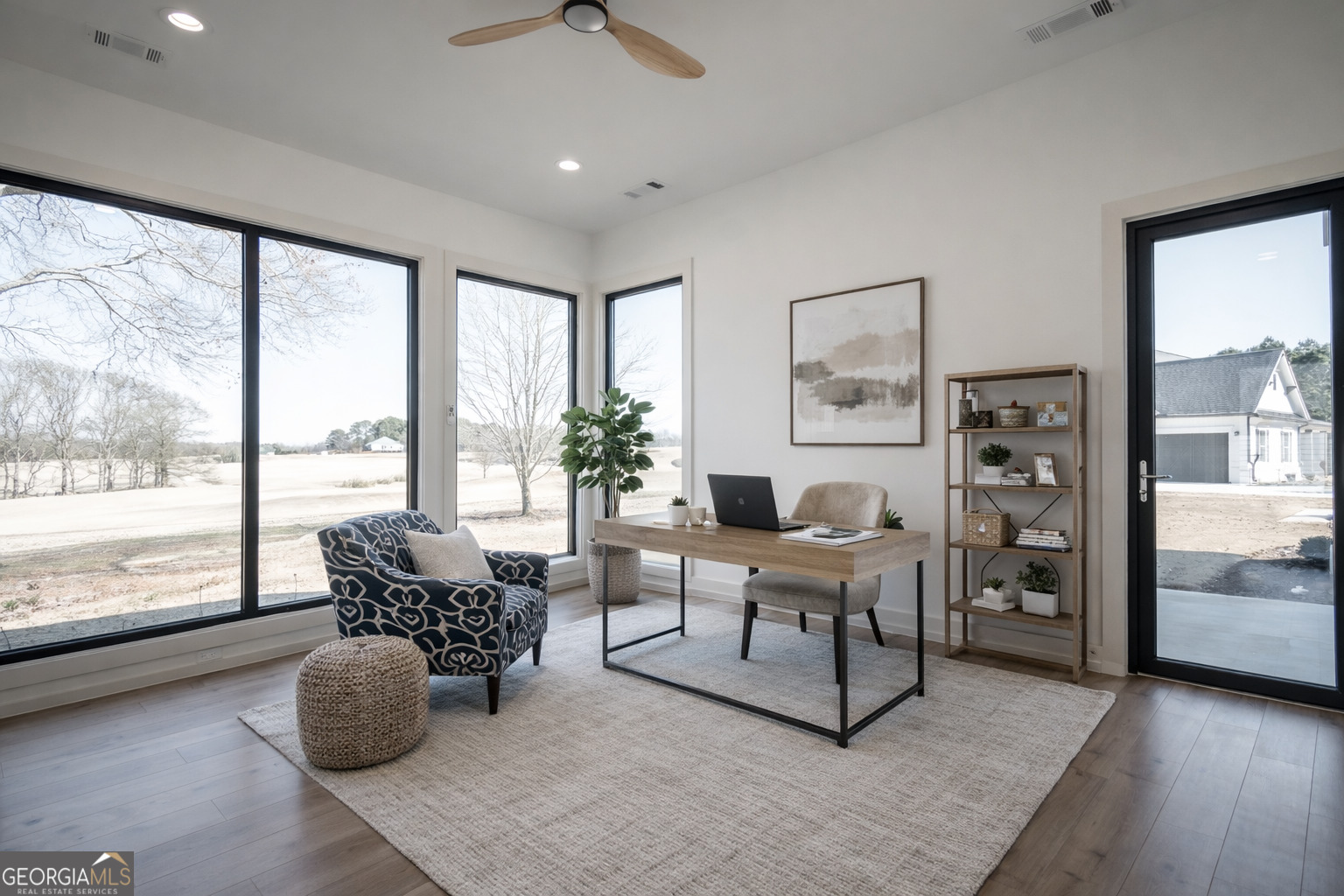 1170 Mulberry Chase Commerce, GA 30530 - Photo 5 of 11 a living room with furniture and large windows