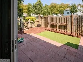 a view of a backyard with a small cabin