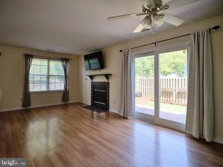 99 Carousel Circle Doylestown, PA 18901 - Photo 5 of 14 a view of an empty room with wooden floor and a window