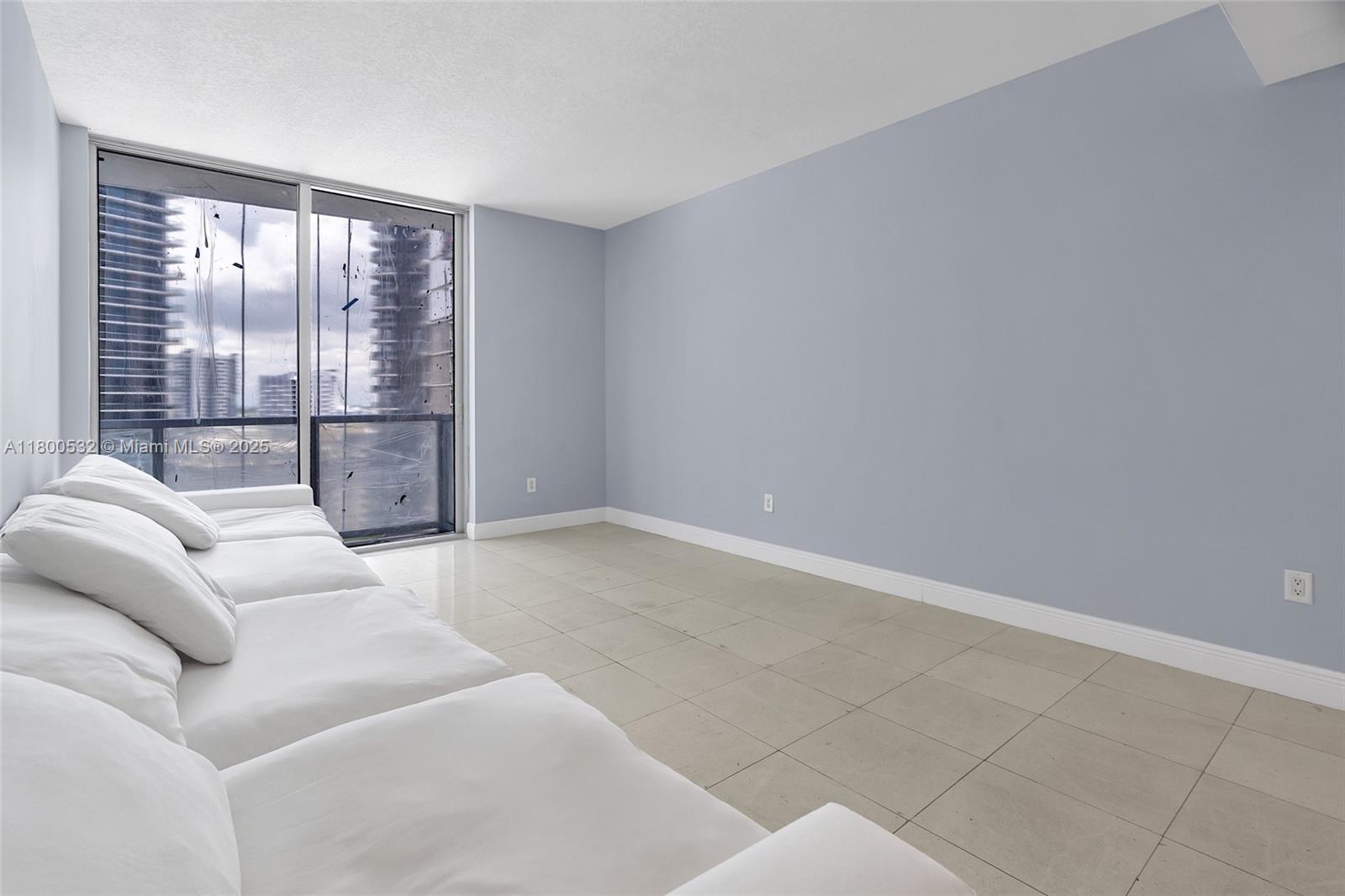 1060 Brickell Avenue, Unit 1811 Miami, FL 33131 - Photo 19 of 43 a view of a livingroom with furniture