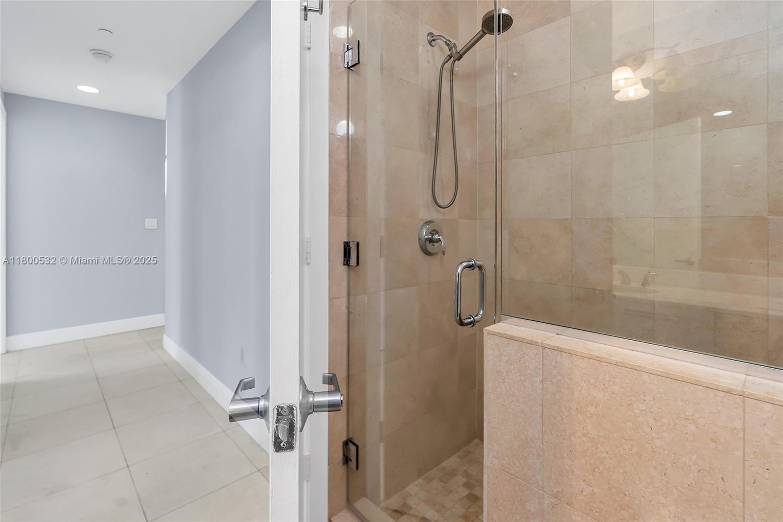 1060 Brickell Avenue, Unit 1811 Miami, FL 33131 - Photo 26 of 43 a bathroom with a shower