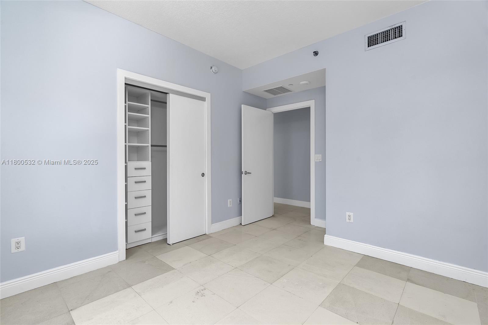 1060 Brickell Avenue, Unit 1811 Miami, FL 33131 - Photo 30 of 43 an empty room with closet