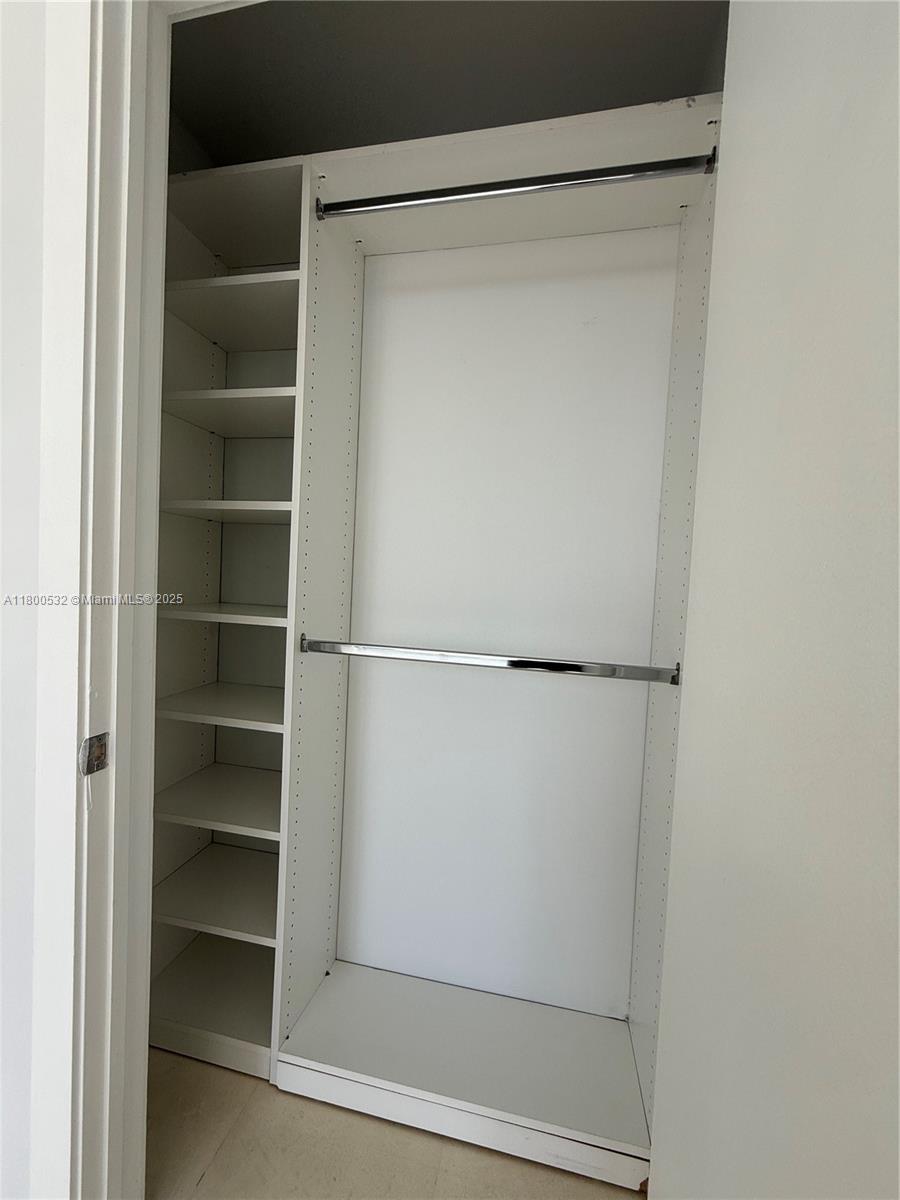 1060 Brickell Avenue, Unit 1811 Miami, FL 33131 - Photo 43 of 43 a view of an empty walk in closet