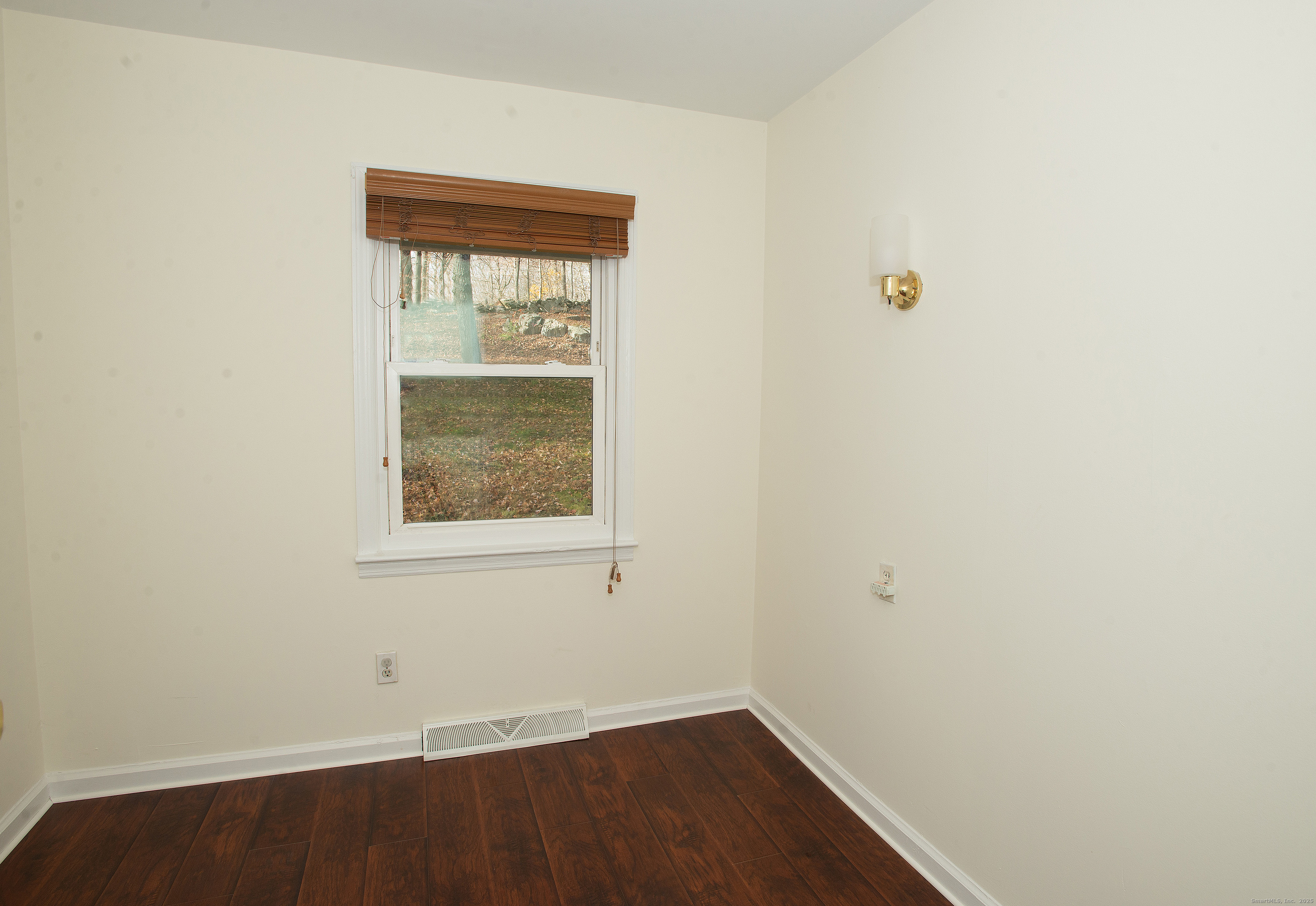 180 Peaceable Ridge Road Ridgefield, CT 06877 - Photo 20 of 28 an empty room with a window