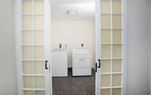 a view of an empty walk in closet