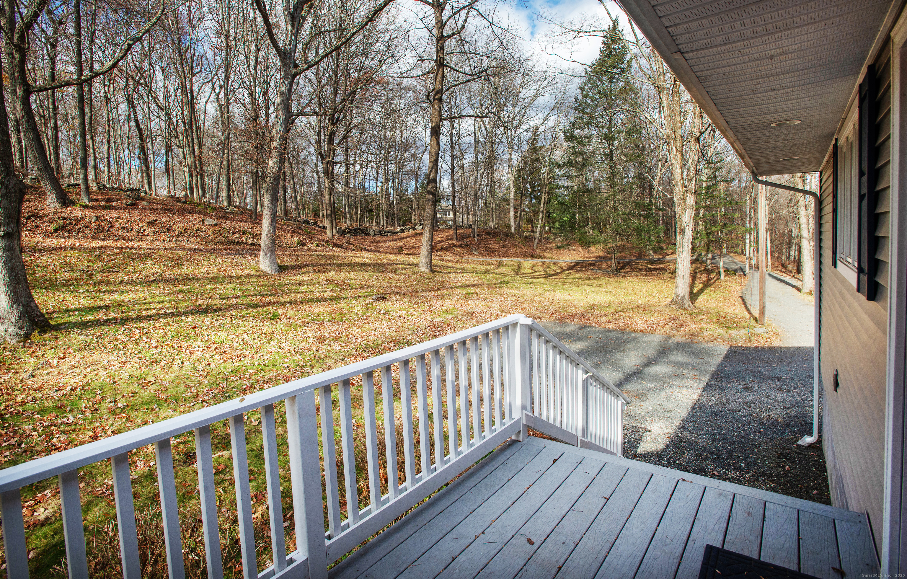 180 Peaceable Ridge Road Ridgefield, CT 06877 - Photo 3 of 28 a view of a swimming pool with a patio