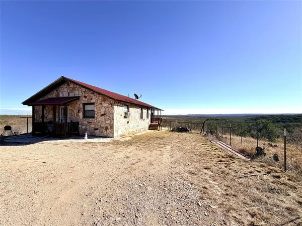 a view of backyard of house