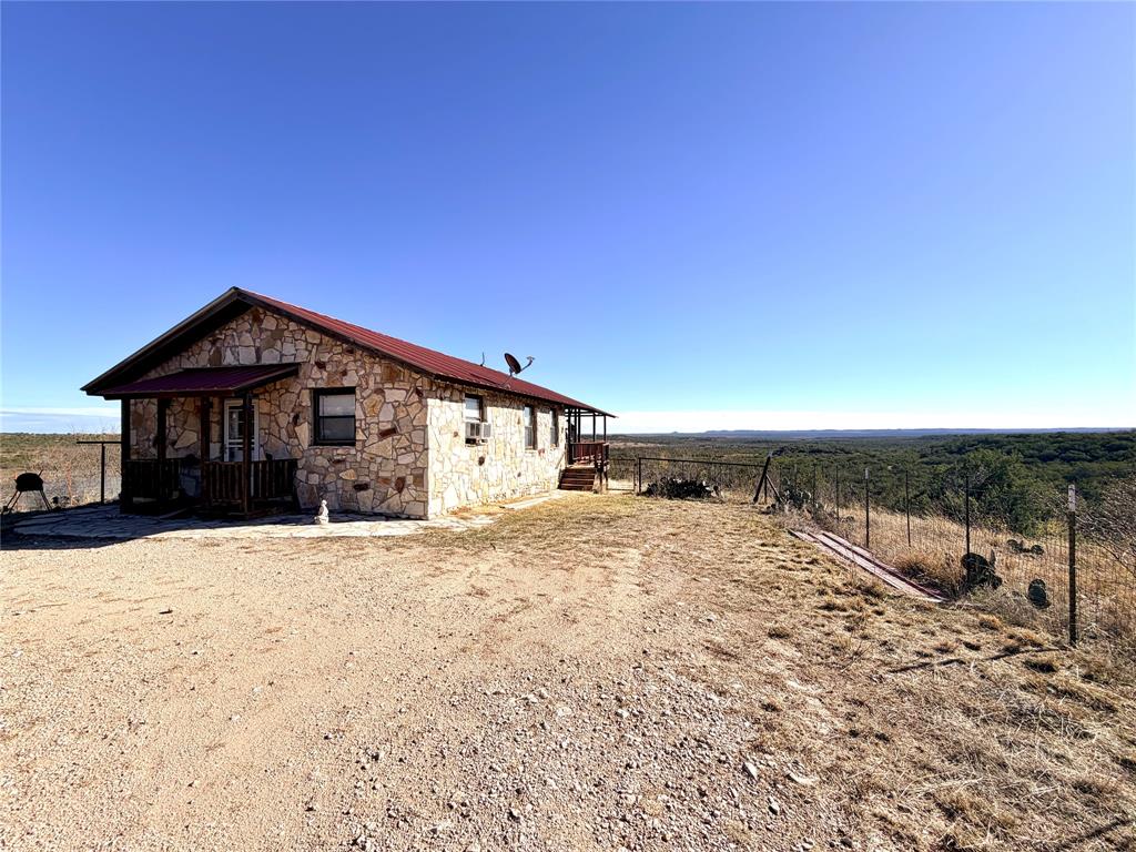 5530 Highway 158 Bronte, TX 76933 - Photo 11 of 40 a view of backyard of house