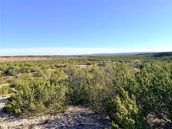 an aerial view of residential space with green space