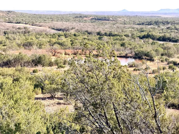 an aerial view of lake residential house and space