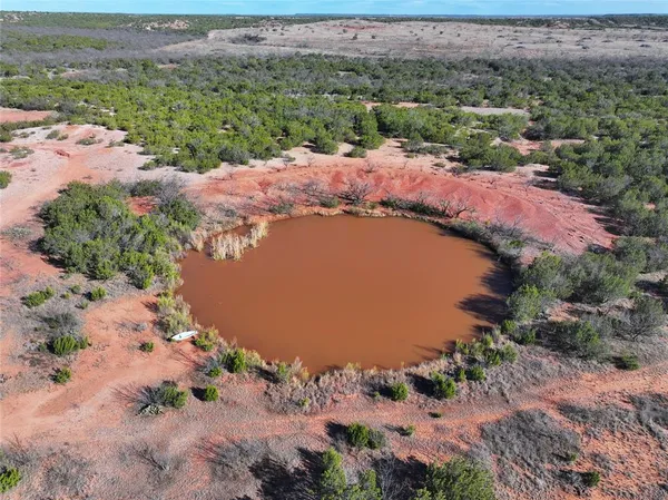 a view of wooden floor and a lake