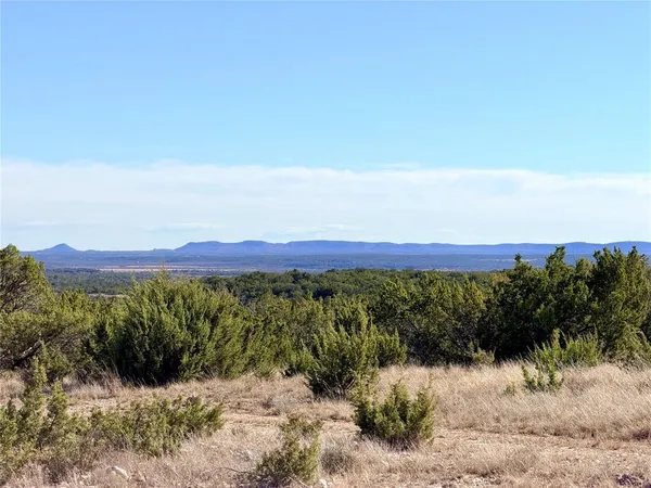 a view of mountain with outdoor space