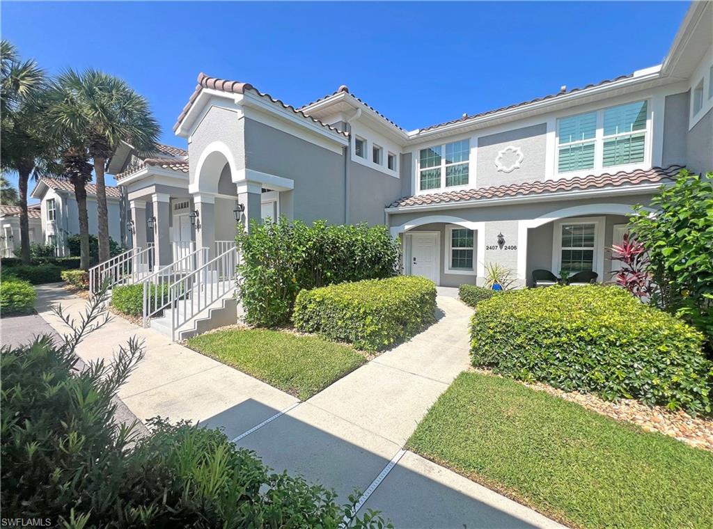 9261 Spring Run Boulevard, Unit 2407 Estero, FL 34135 - Photo 1 of 24 Building front and entry
