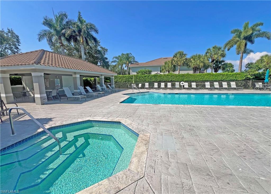 9261 Spring Run Boulevard, Unit 2407 Estero, FL 34135 - Photo 17 of 24 Neighborhood pool and hot tub