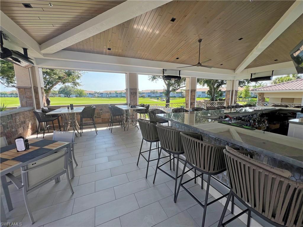 9261 Spring Run Boulevard, Unit 2407 Estero, FL 34135 - Photo 23 of 24 Clubhouse all new exterior bar