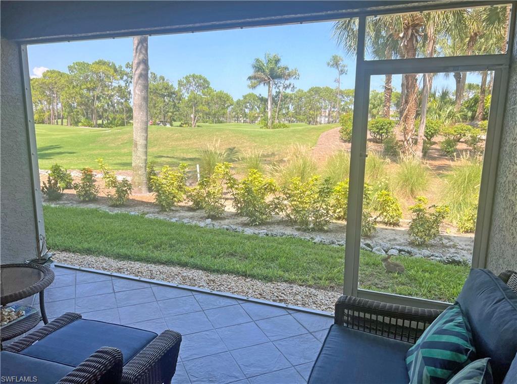 9261 Spring Run Boulevard, Unit 2407 Estero, FL 34135 - Photo 5 of 24 Lanai with golf course view
