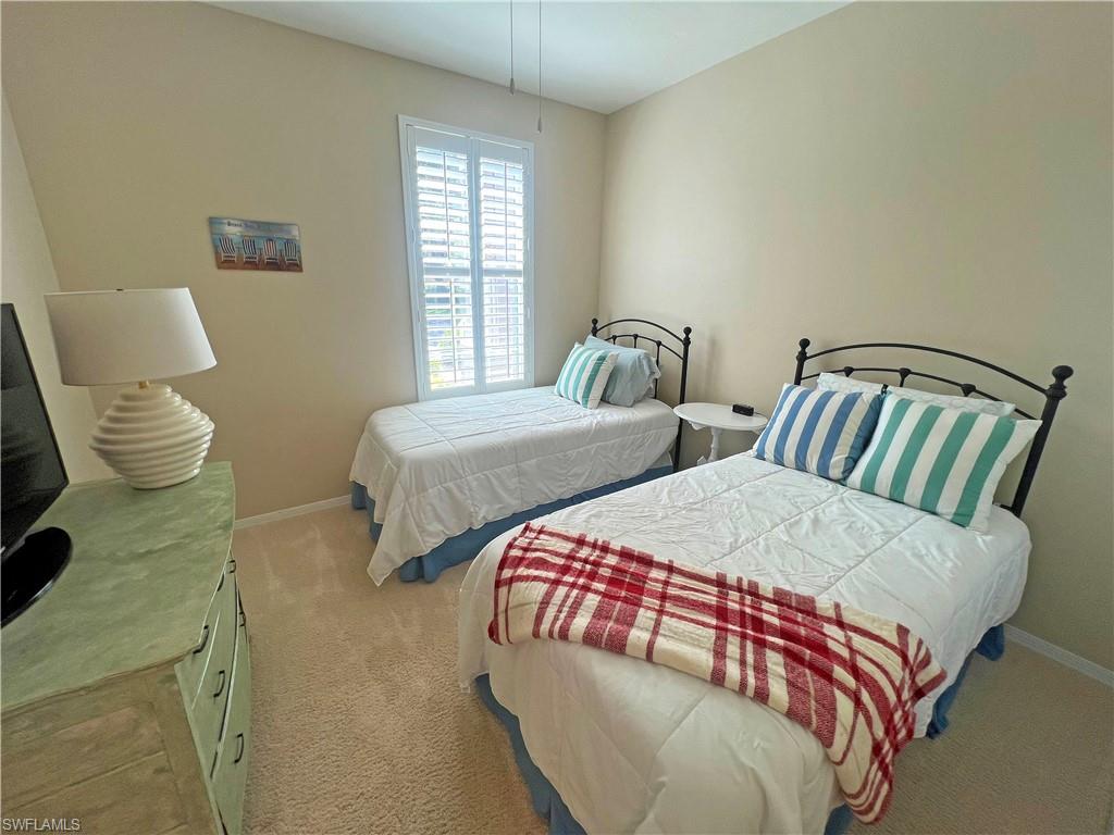 9261 Spring Run Boulevard, Unit 2407 Estero, FL 34135 - Photo 10 of 24 Guest bedroom