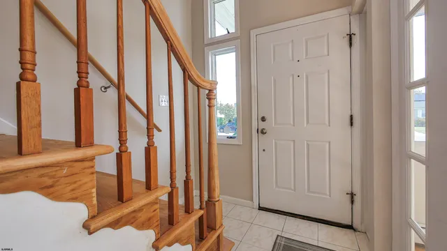 a view of an entryway with staircase
