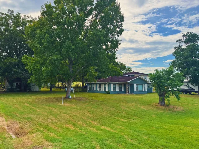 a view of a house with a swimming pool