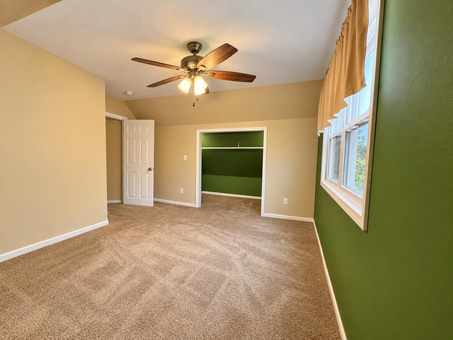 2063 Green Street Racine, WI 53402 - Photo 18 of 27 Empty Olive-and-Beige Attic Bedroom