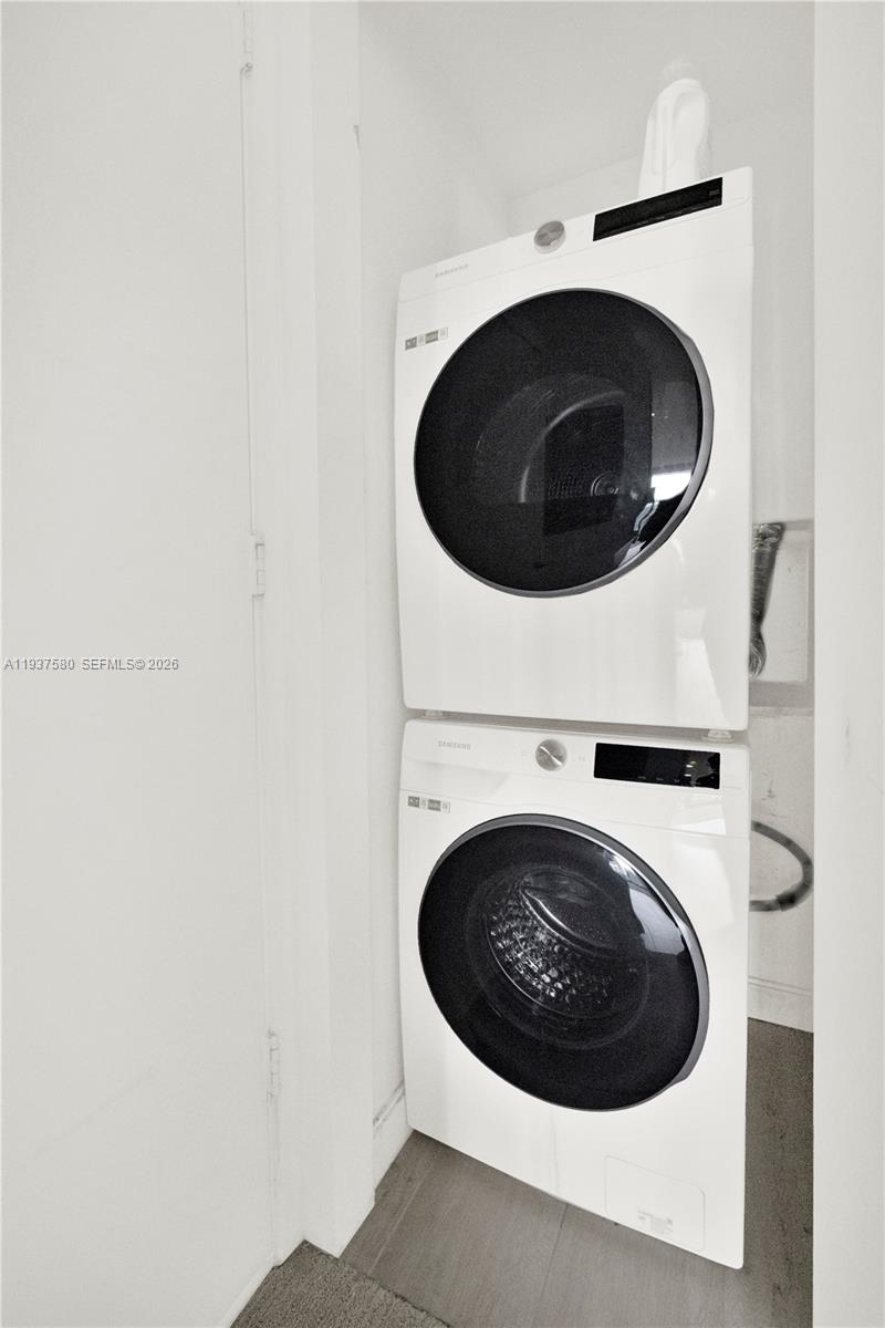 45 Southwest 9th Street, Unit 1609 Miami, FL 33130 - Photo 22 of 39 a close up view of a washer and dryer
