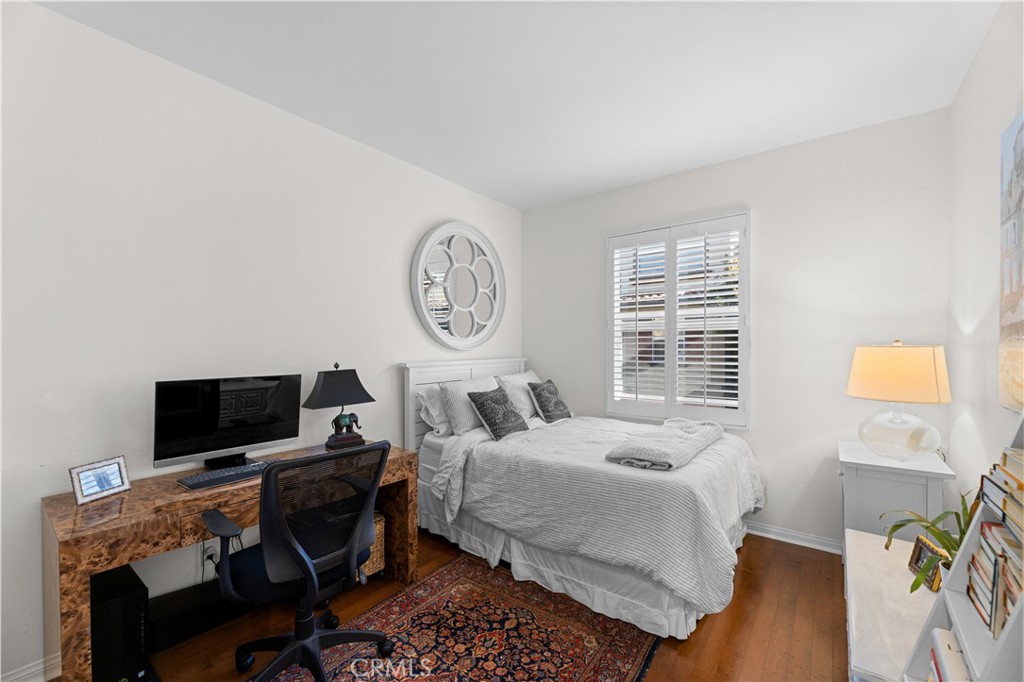 122 Jadestone Irvine, CA 92603 - Photo 11 of 20 a bedroom with a bed and a window