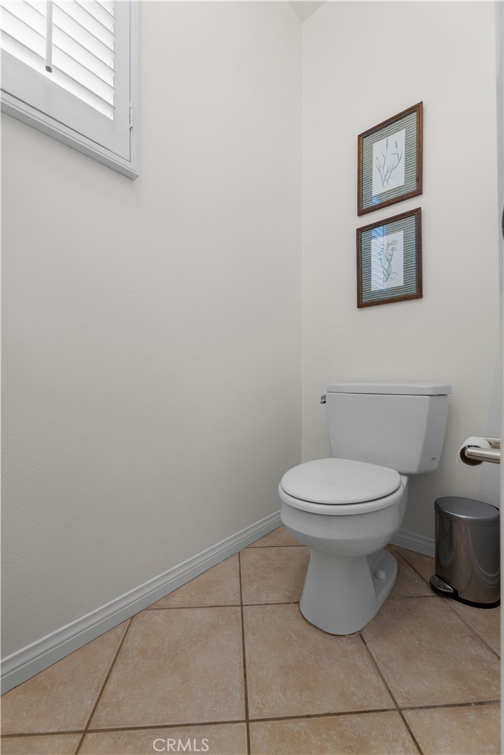 122 Jadestone Irvine, CA 92603 - Photo 19 of 20 a bathroom with a toilet