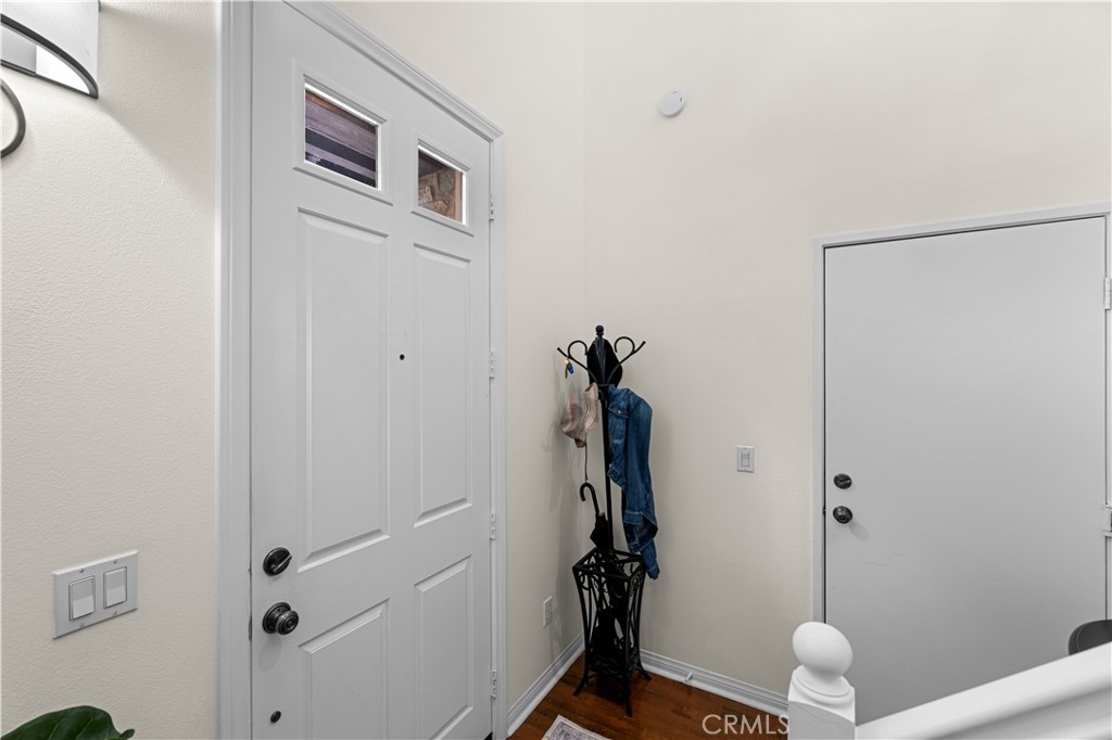 122 Jadestone Irvine, CA 92603 - Photo 3 of 20 a view of a room with rack on the wall