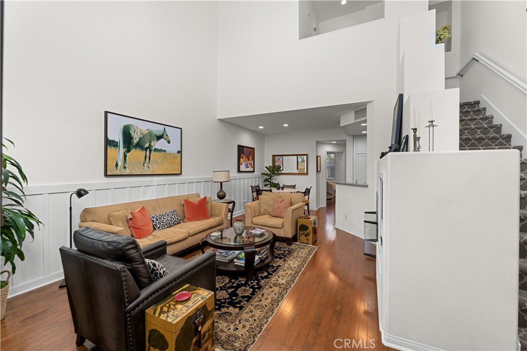 122 Jadestone Irvine, CA 92603 - Photo 7 of 20 a living room with furniture and a couch