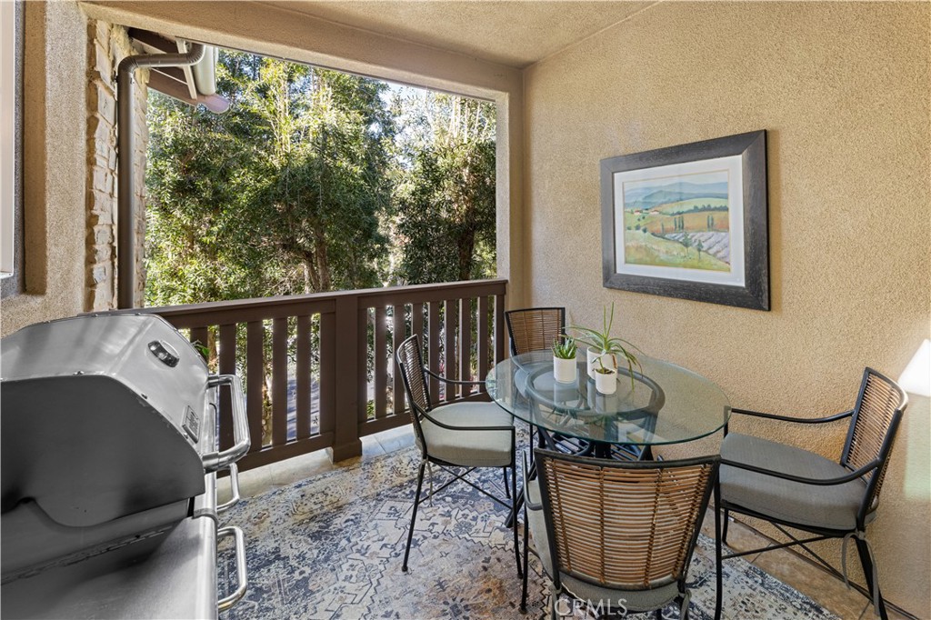 122 Jadestone Irvine, CA 92603 - Photo 8 of 20 a living room with furniture and a window