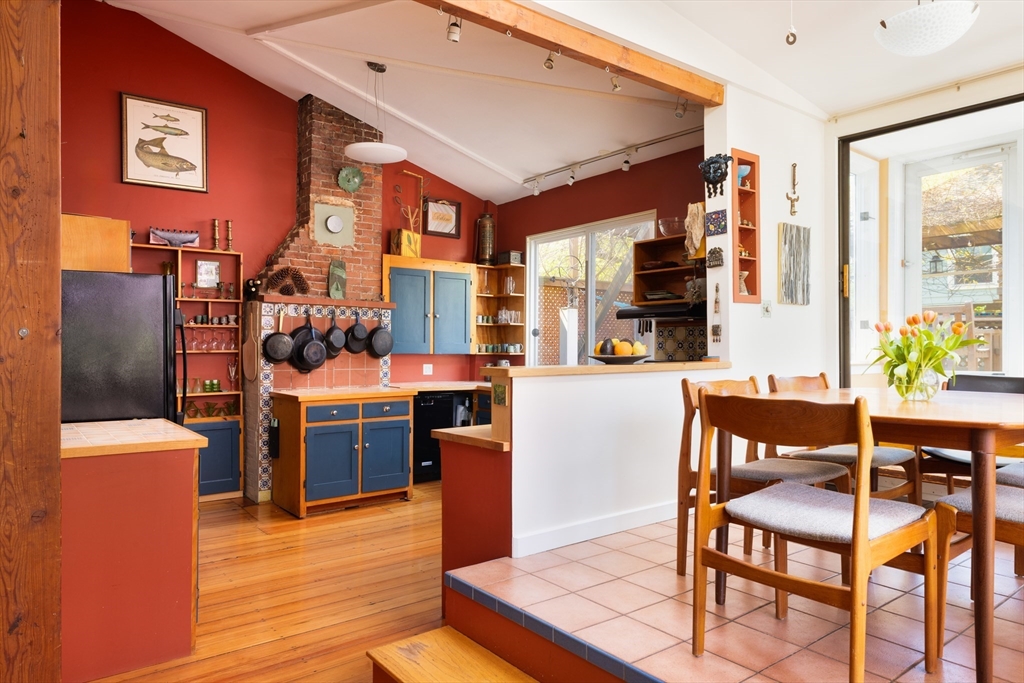 135 Langley Road Newton, MA 02459 - Photo 5 of 20 a dining room with furniture and wooden floor