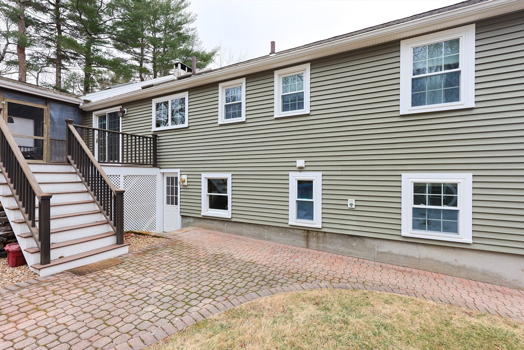 68 Greene Street, Unit A Hopedale, MA 01747 - Photo 2 of 26 a backyard of a house