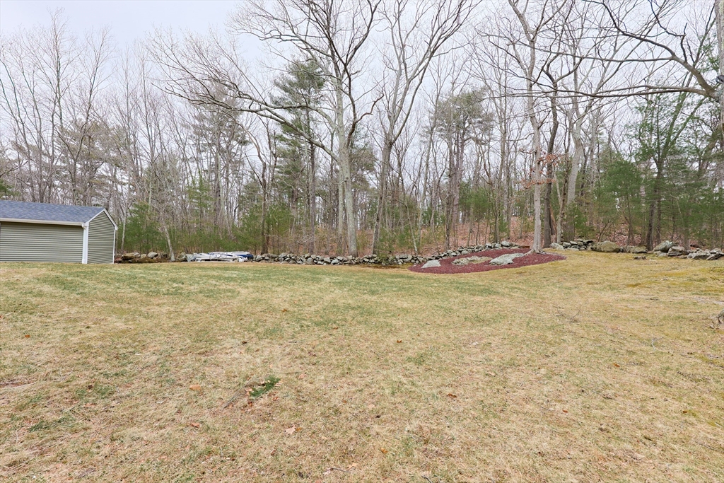 68 Greene Street, Unit A Hopedale, MA 01747 - Photo 26 of 26 a view of outdoor space with trees