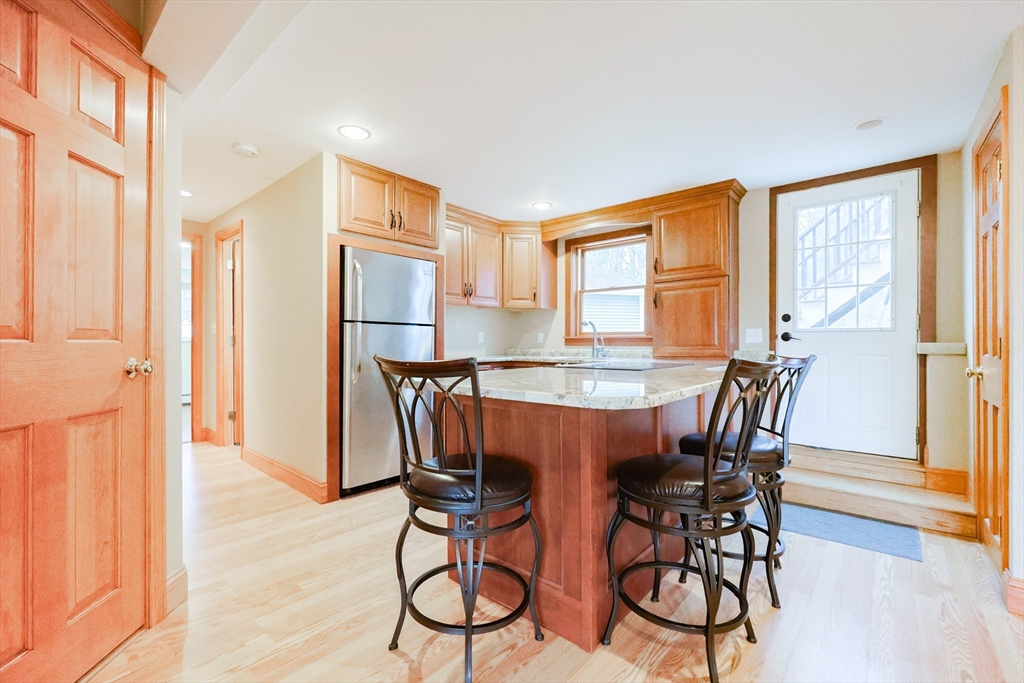 68 Greene Street, Unit A Hopedale, MA 01747 - Photo 9 of 26 a dining room with furniture and window
