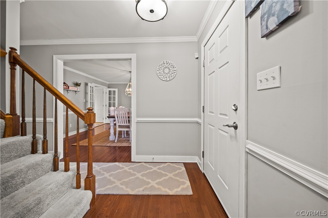 13441 Bailey Bridge Road Midlothian, VA 23112 - Photo 21 of 48 a view of entryway and hall with wooden floor