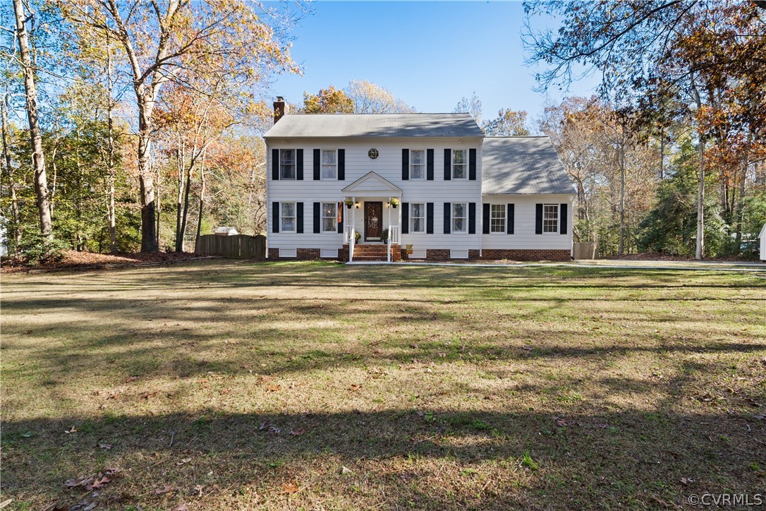 13441 Bailey Bridge Road Midlothian, VA 23112 - Photo 3 of 48 a front view of a house with a ocean view