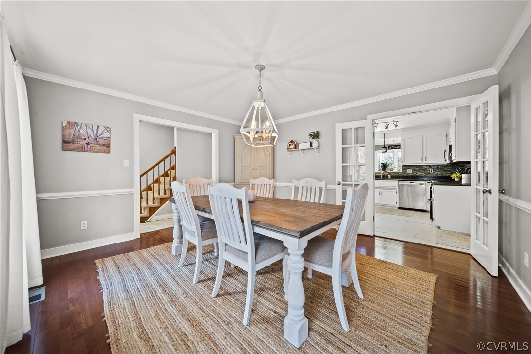 13441 Bailey Bridge Road Midlothian, VA 23112 - Photo 8 of 48 a view of a dining room with furniture and wooden floor