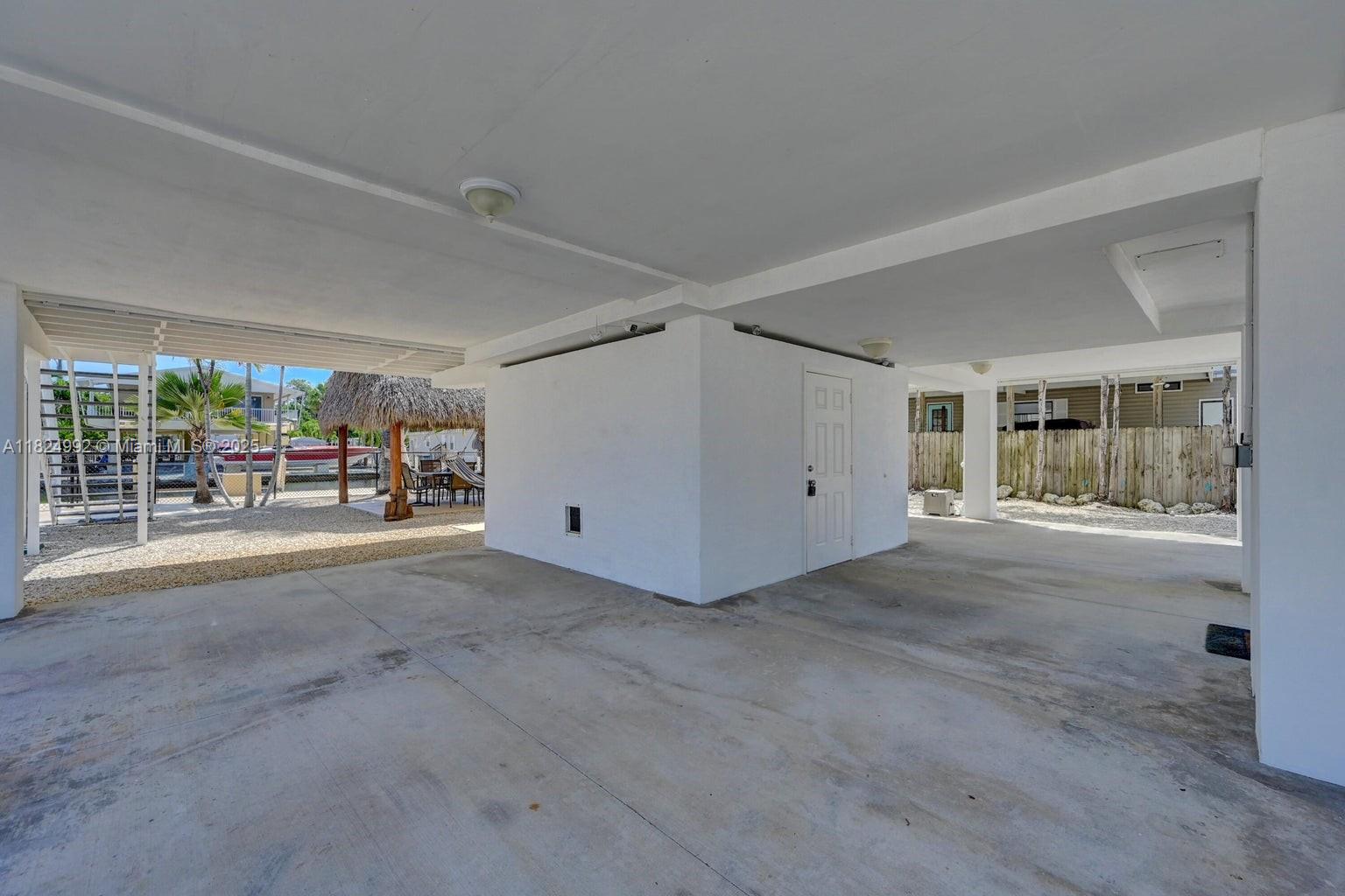 239 Lower Matecumbe Road Key Largo, FL 33037 - Photo 57 of 70 a view of a storage & utility room