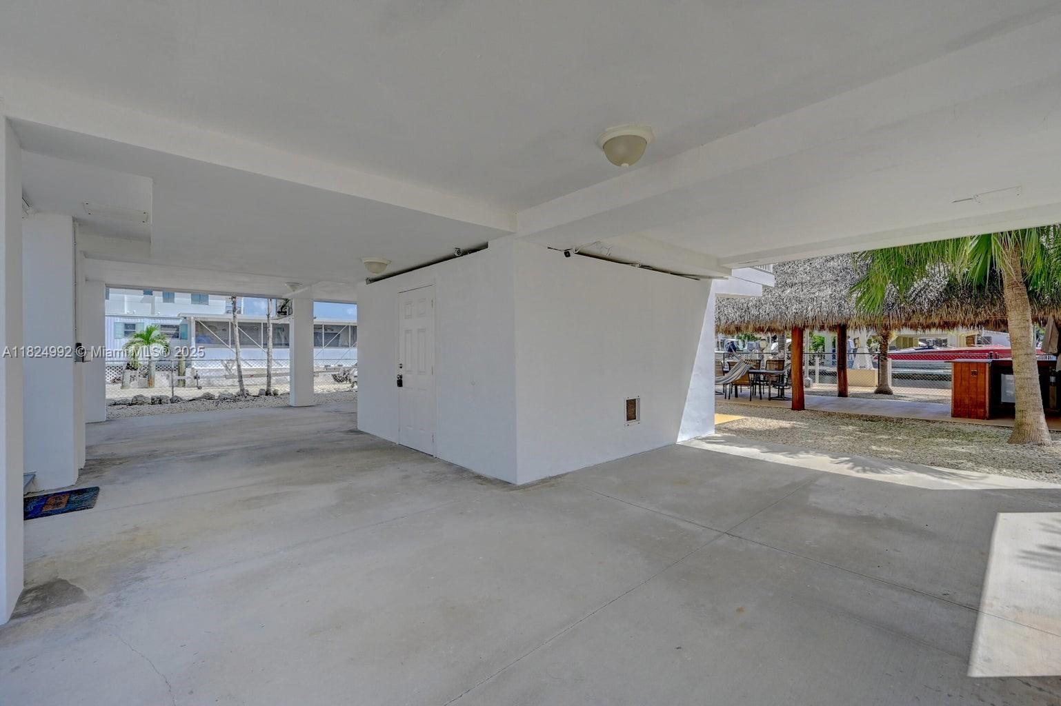 239 Lower Matecumbe Road Key Largo, FL 33037 - Photo 58 of 70 a view of a livingroom with furniture and window