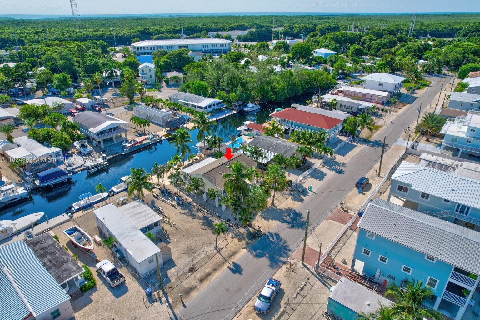 239 Lower Matecumbe Road Key Largo, FL 33037 - Photo 59 of 70 an aerial view of residential houses with outdoor space