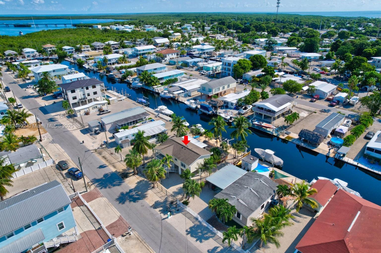 239 Lower Matecumbe Road Key Largo, FL 33037 - Photo 63 of 70 an aerial view of residential houses with outdoor space