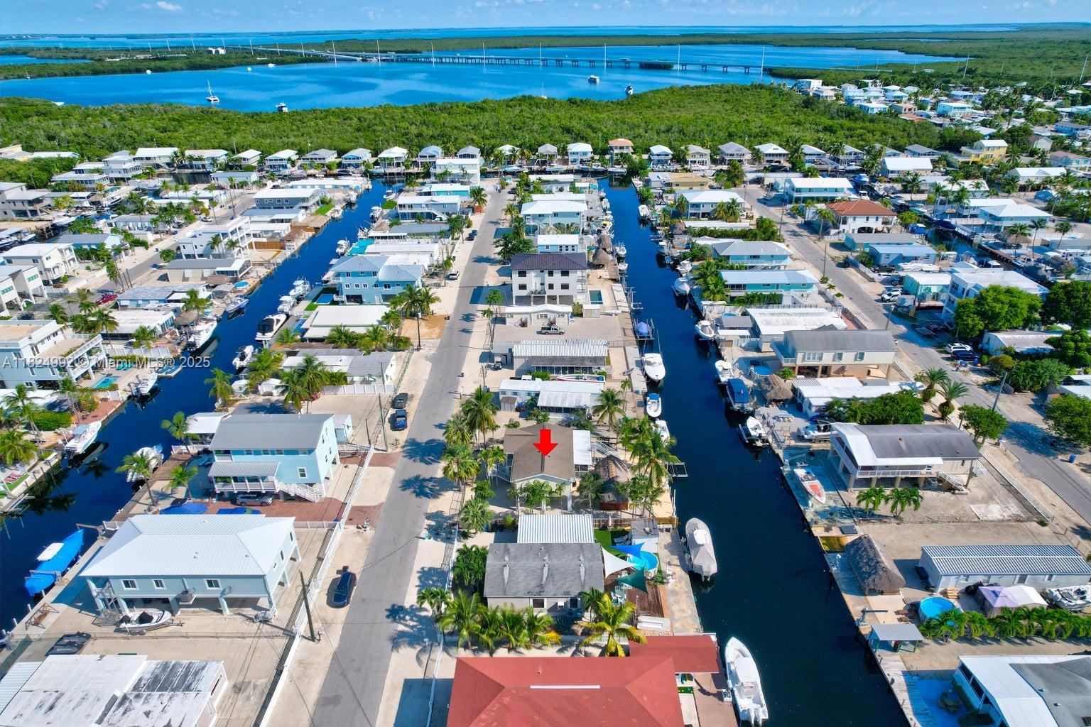 239 Lower Matecumbe Road Key Largo, FL 33037 - Photo 64 of 70 an aerial view of residential houses with outdoor space