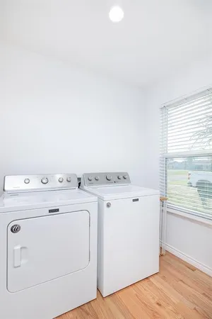 a utility room with dryer and washer