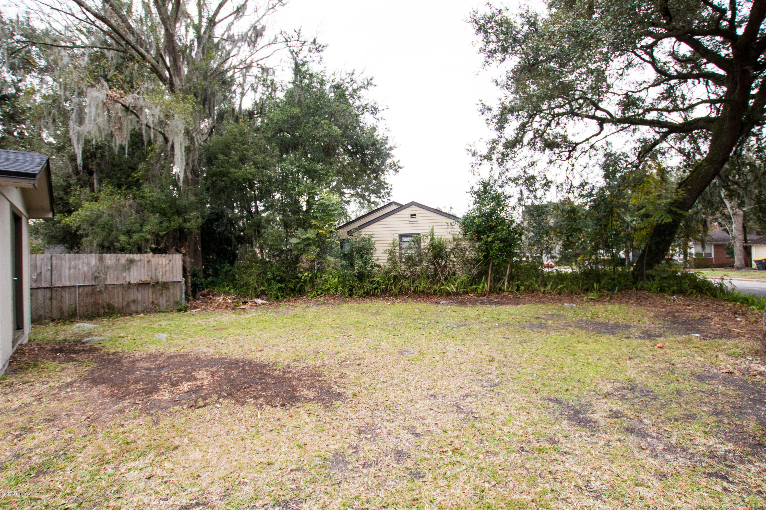 2839 Spring Park Road Jacksonville, FL 32207 - Photo 18 of 19 a view of a yard with a trees