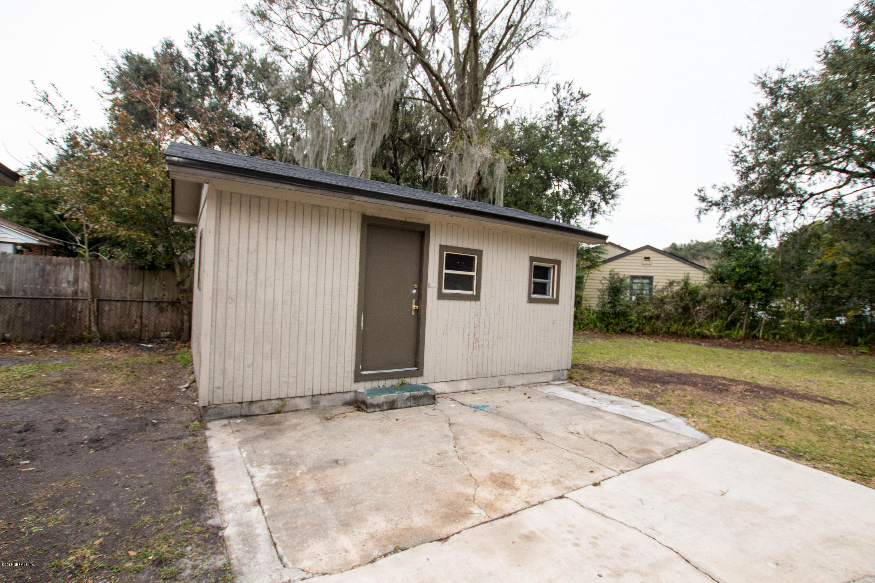 2839 Spring Park Road Jacksonville, FL 32207 - Photo 19 of 19 a view of a house with a yard