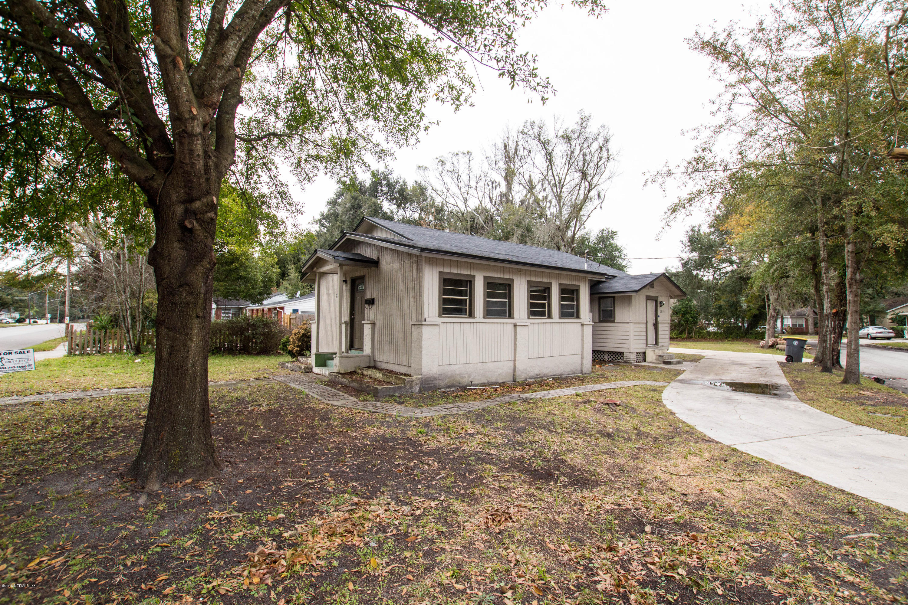 2839 Spring Park Road Jacksonville, FL 32207 - Photo 3 of 19 a view of a house with a yard